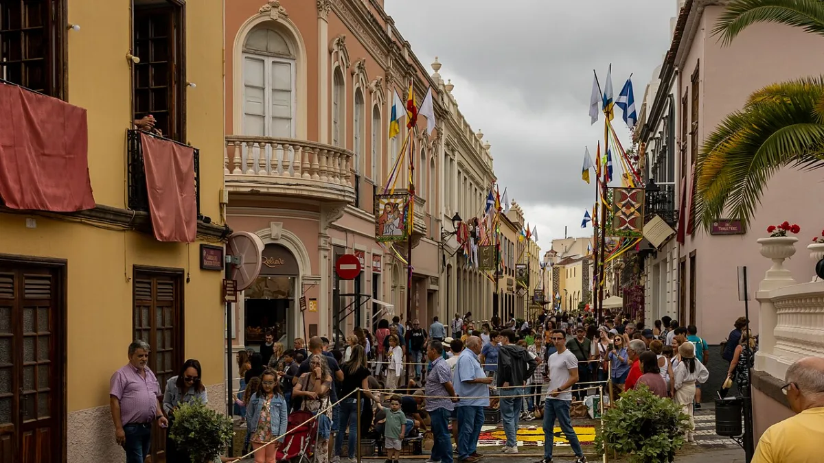 Corpus Christi flower carpets and spectators in La Orotava, Tenerife, on 23 June 2022, beside Plaza del Ayuntamiento.